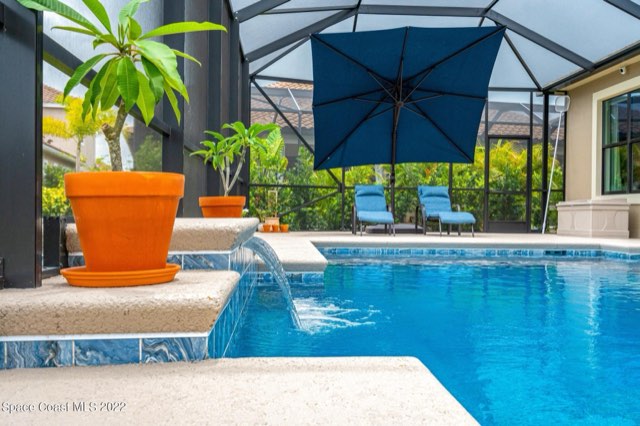Water feature spilling into the pool